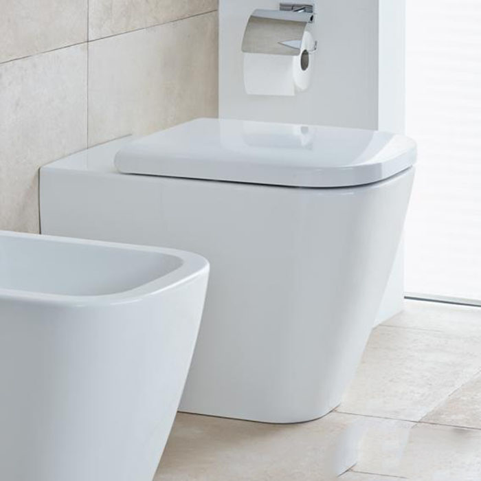 Duravit Happy D.2 Унитаз напольный 36.5x57см, пристенный вариант, для независимого подключения воды, с вертикальным смывом, включая крепление, сток горизонтальны